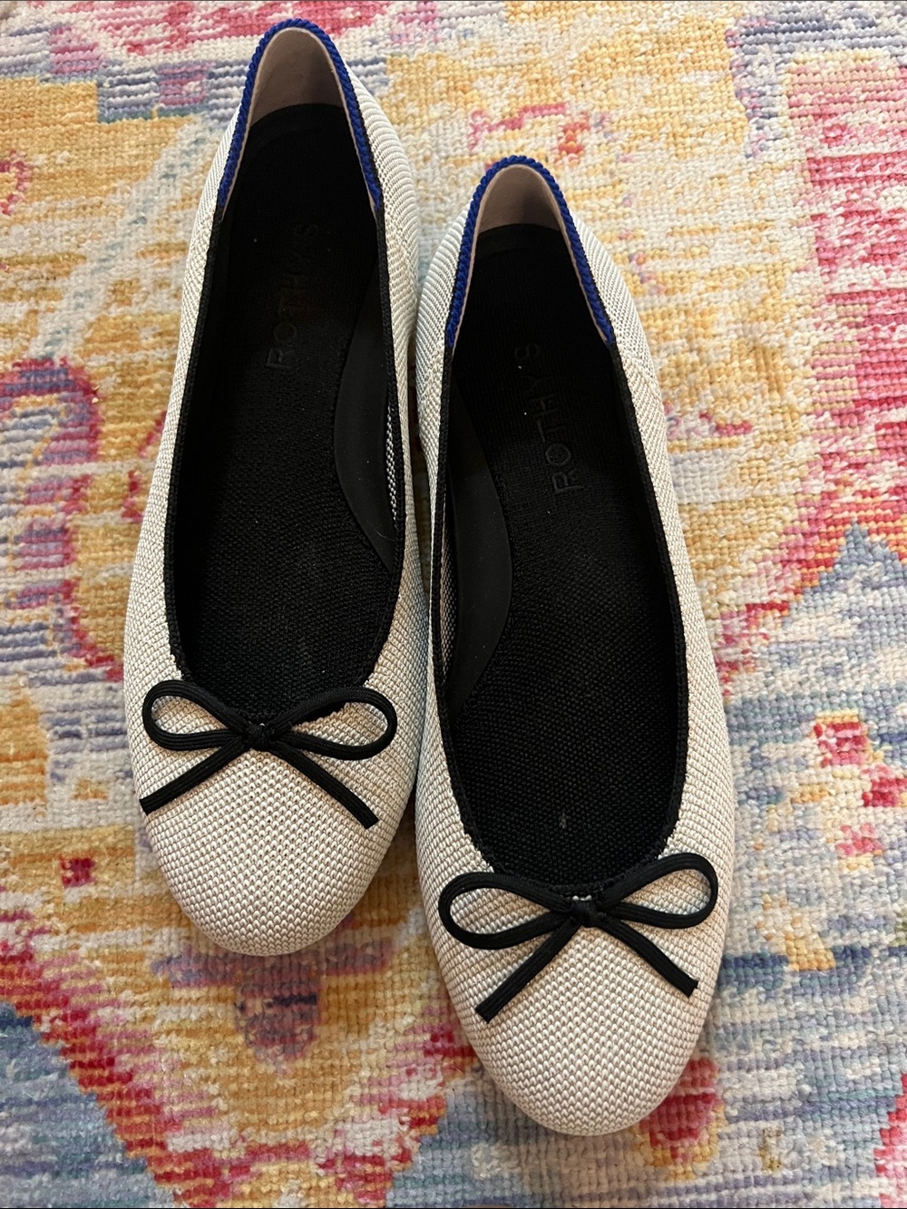 Rothy's silver  Ballet Flats with Black Trim and Blue Heel Accent